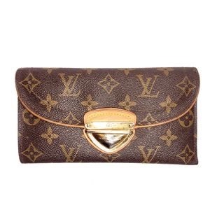Vintage authentic Louis Vuitton LV monogram canvas Eugenie wallet.